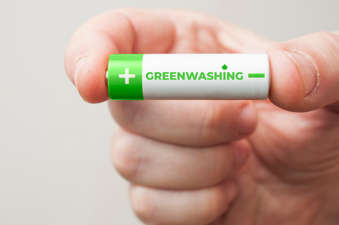 Man Holding a Green and White Battery with Greenwashing Text